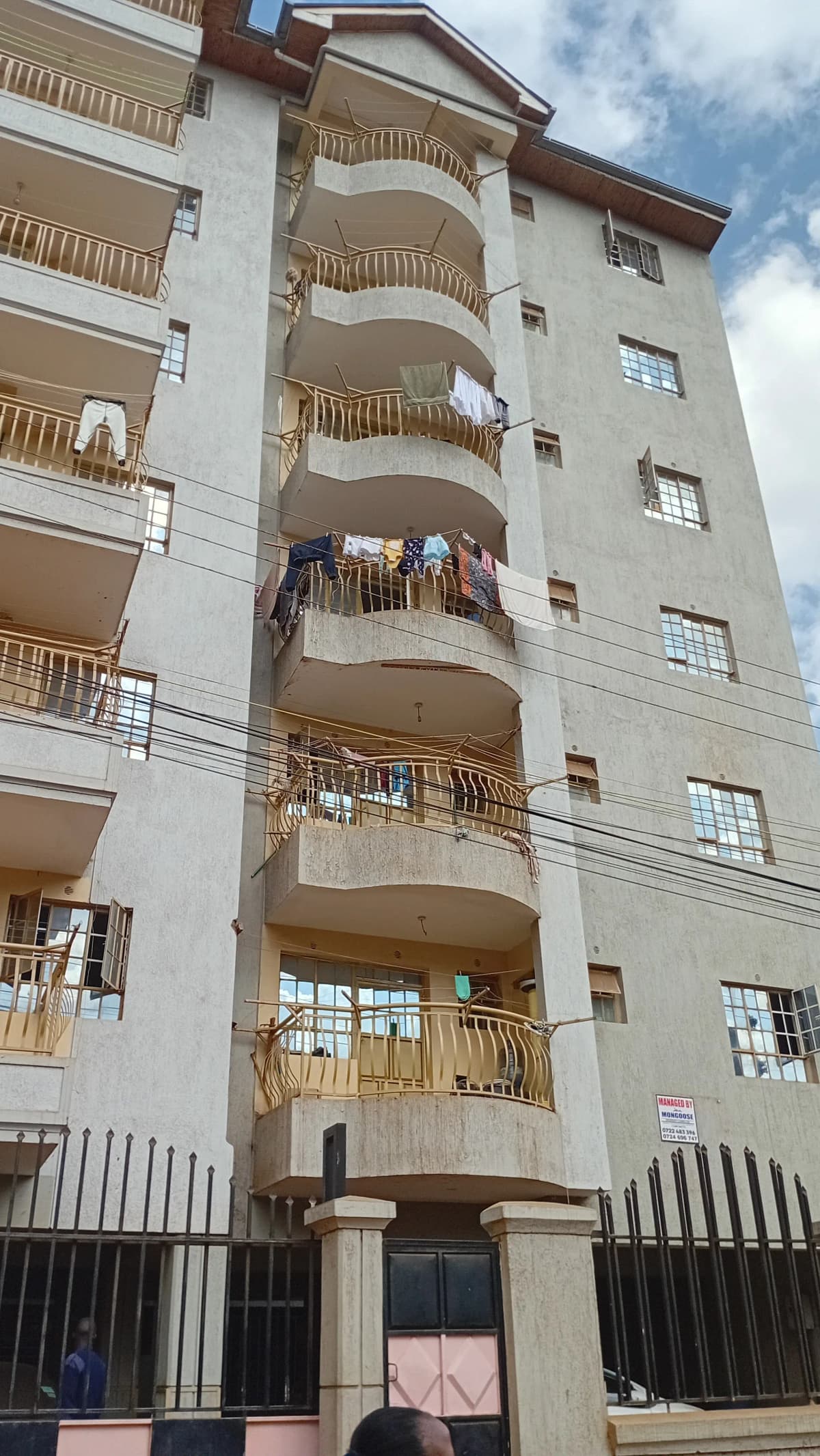 Multi-story residential building facade with balconies