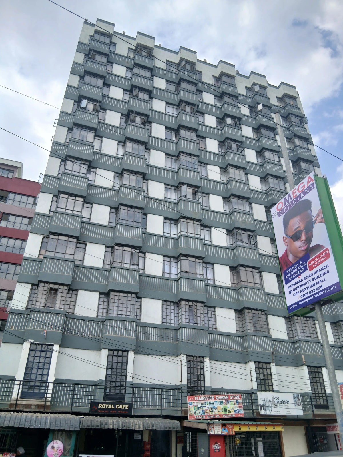 Multi-story residential building facade with balconies