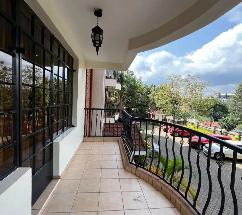 Spacious balcony with panoramic views and black railing