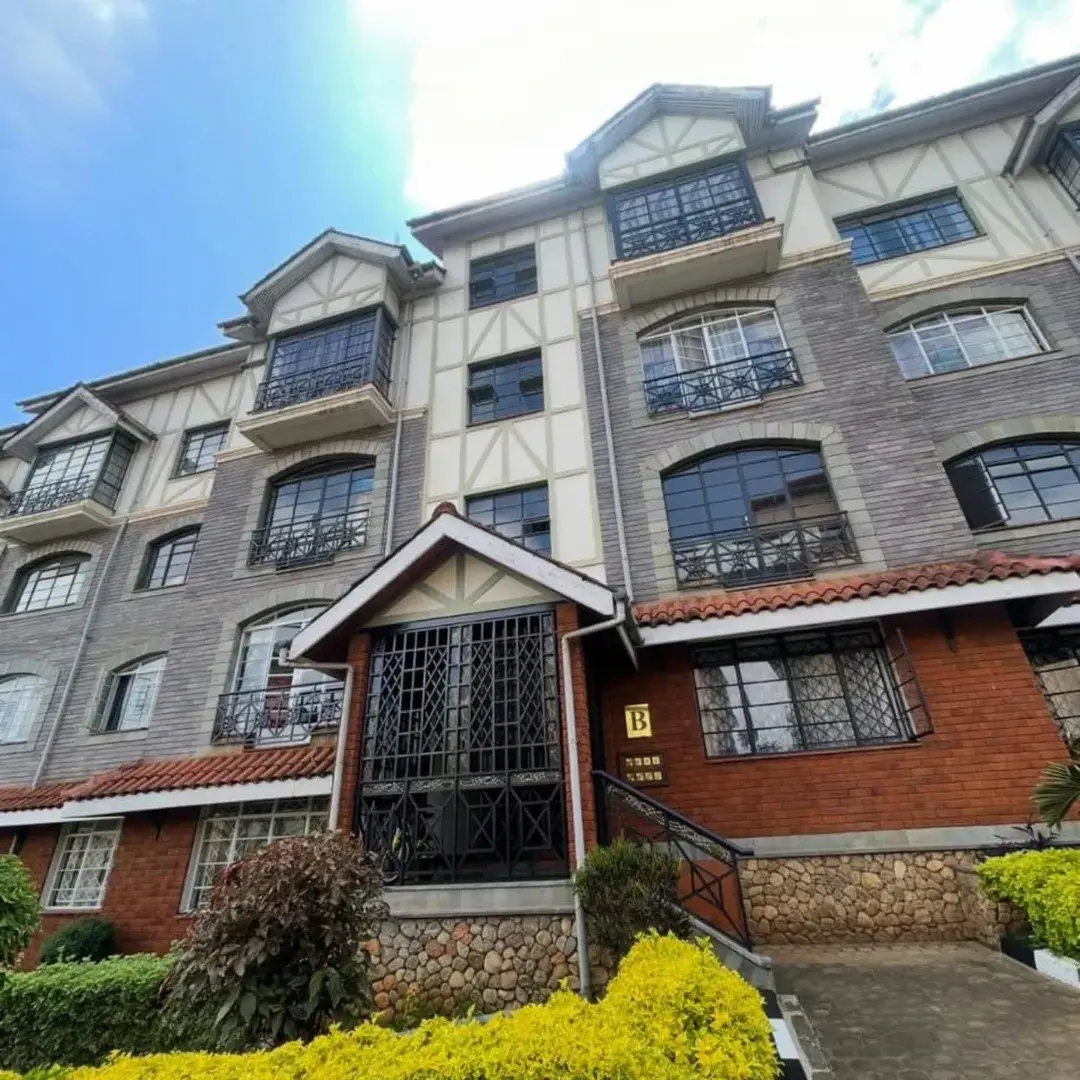Multi-story residential building with brick and stone facade