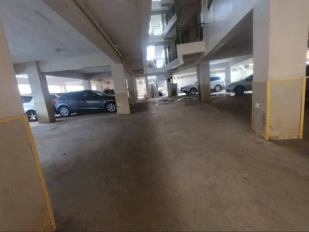 Underground basement parking with multiple vehicle bays