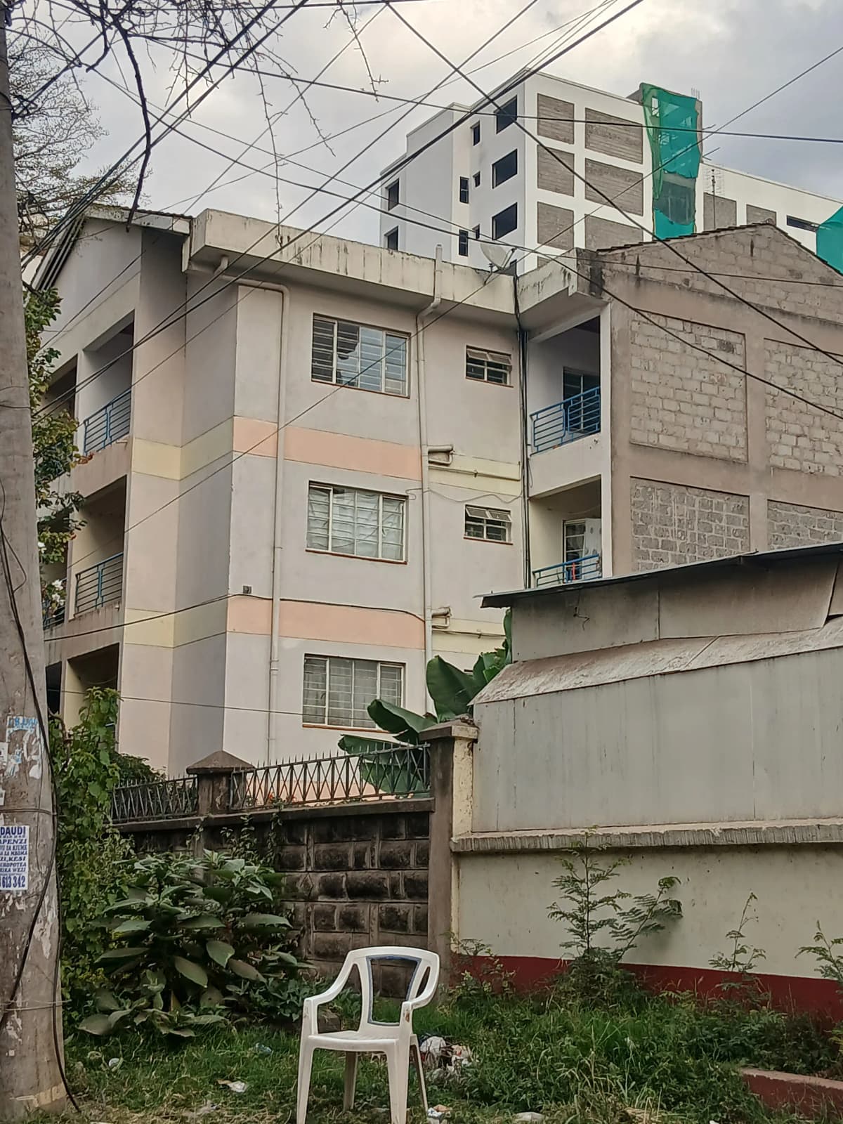 Multi-story residential building facade with balconies