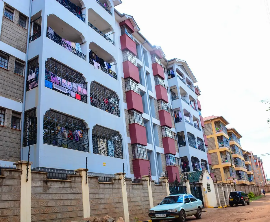 Multi-story residential apartment building with colorful facades