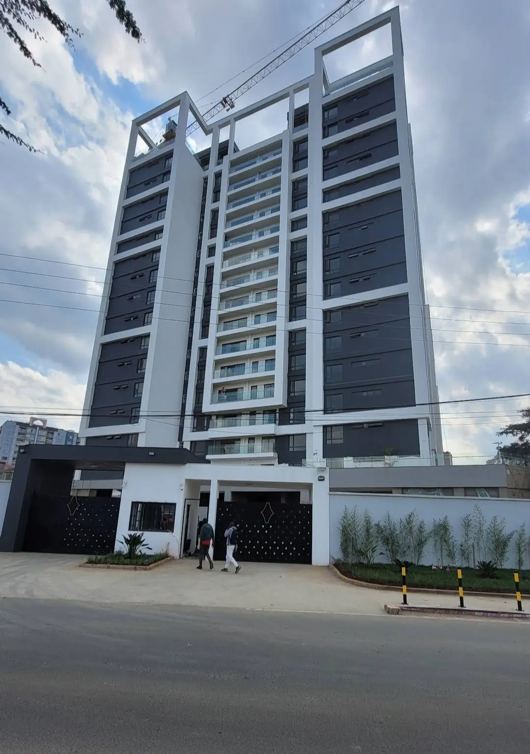 Modern multi-story residential building with contemporary facade