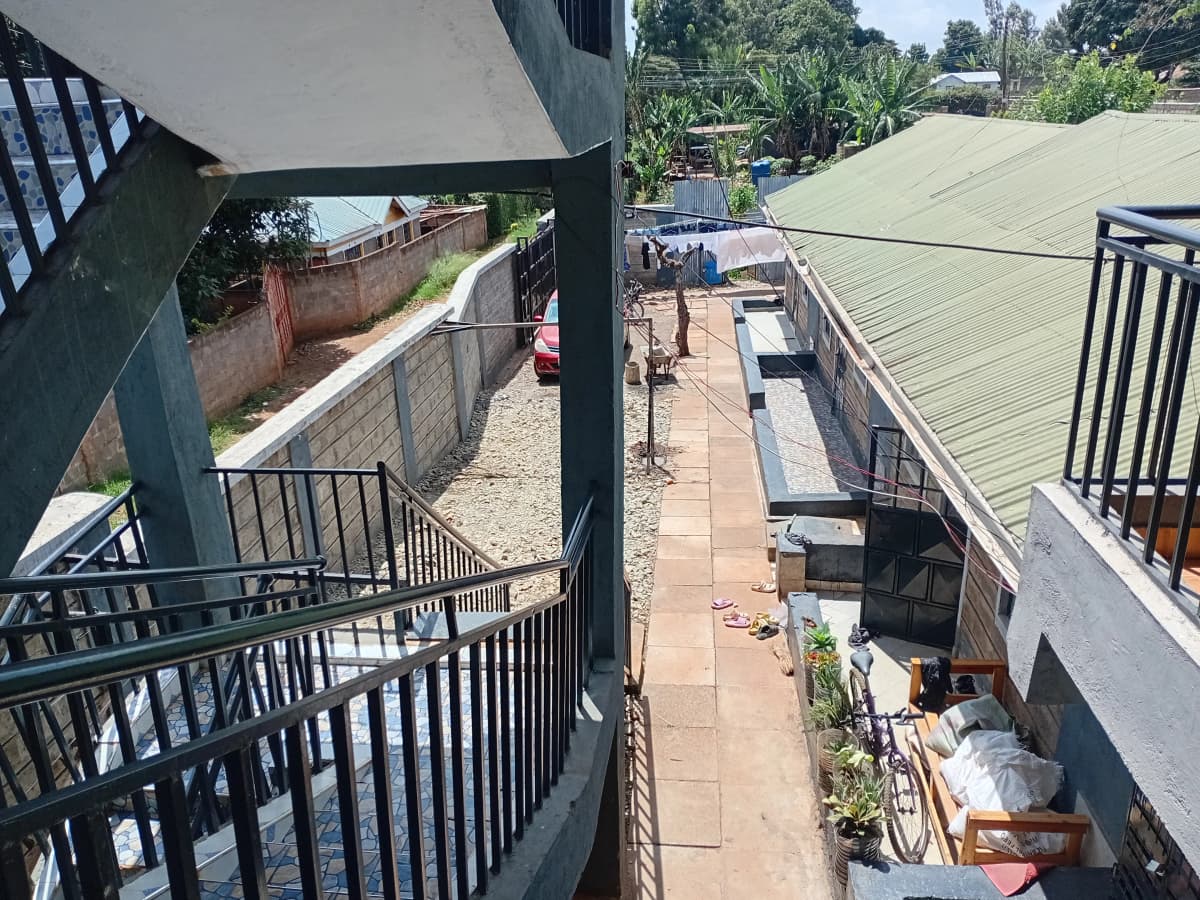 Multi-level balcony terrace with compound grounds below