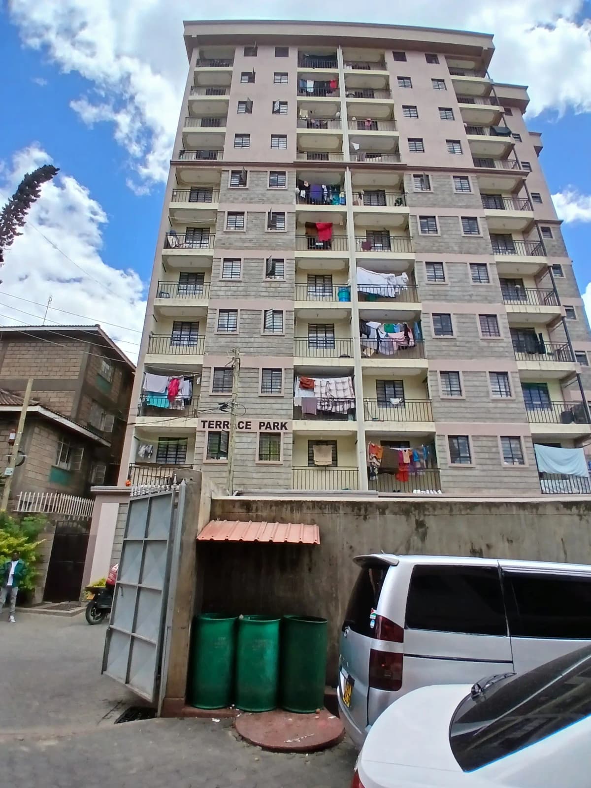Multi-story residential apartment building facade with balconies