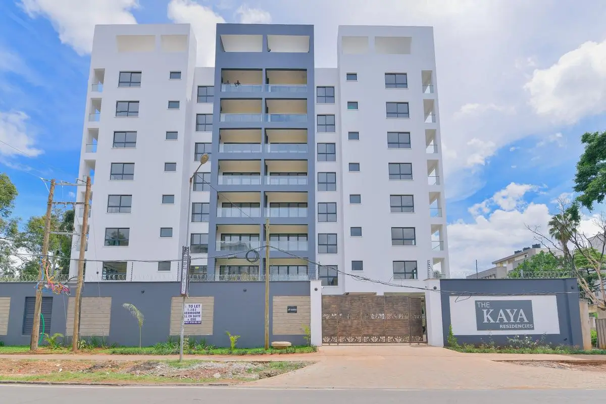 Modern multi-story residential building facade with balconies