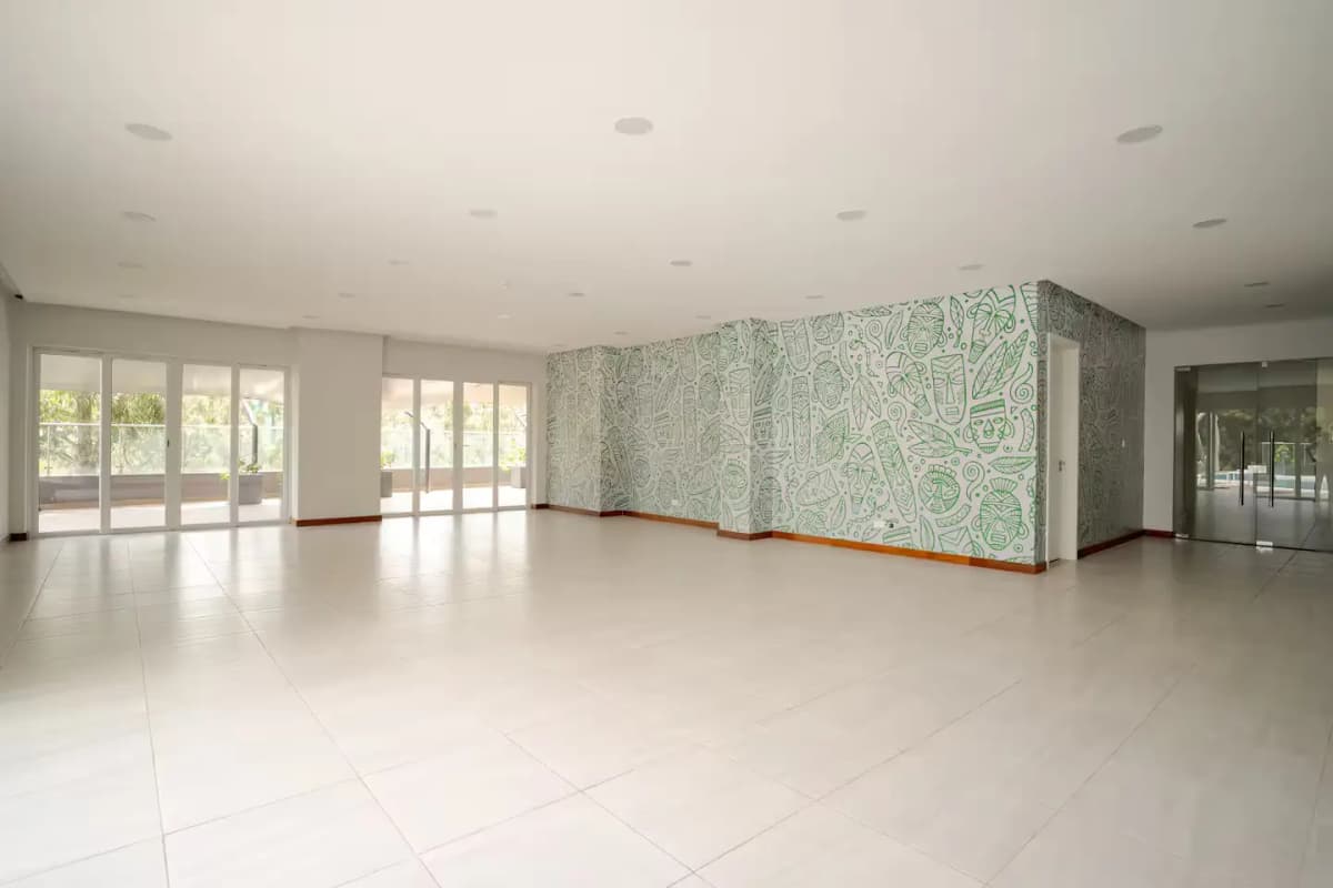 Spacious empty lobby with polished floors and natural light