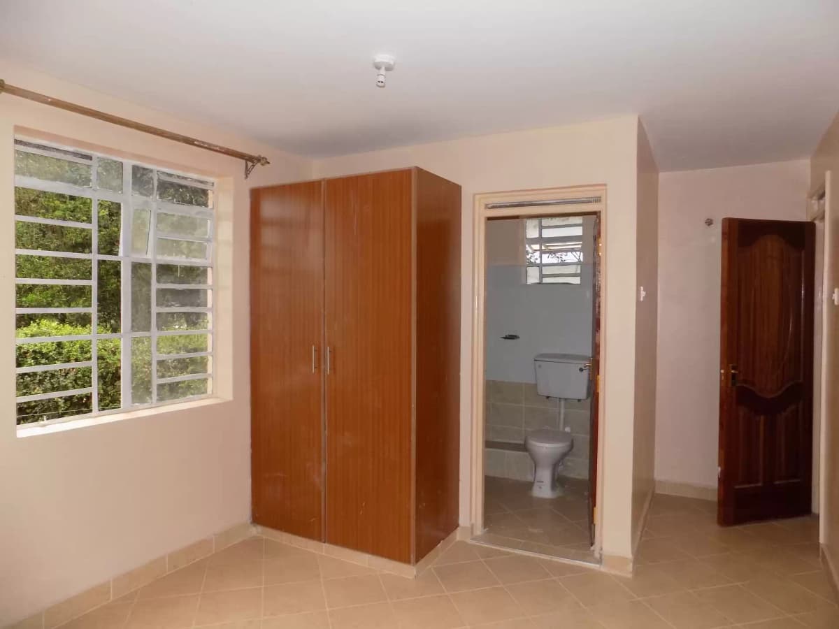 Spacious bedroom with built-in wardrobe and ensuite bathroom
