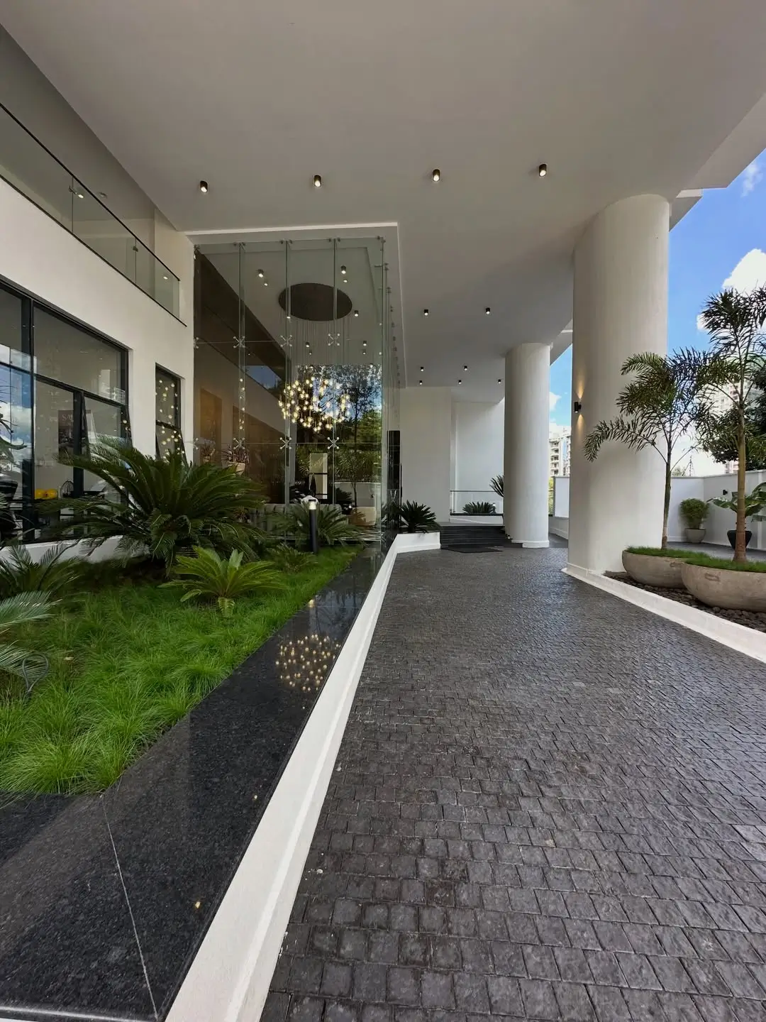 Modern building lobby with integrated landscaping and plants