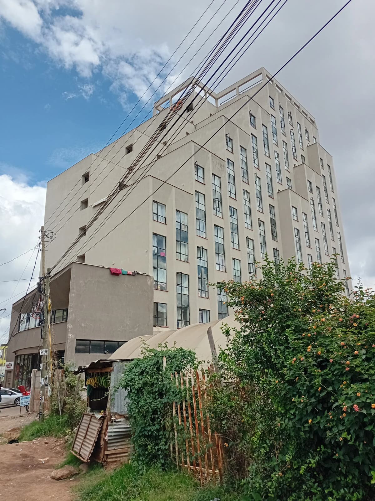 Multi-story residential building facade with ground-level entrance
