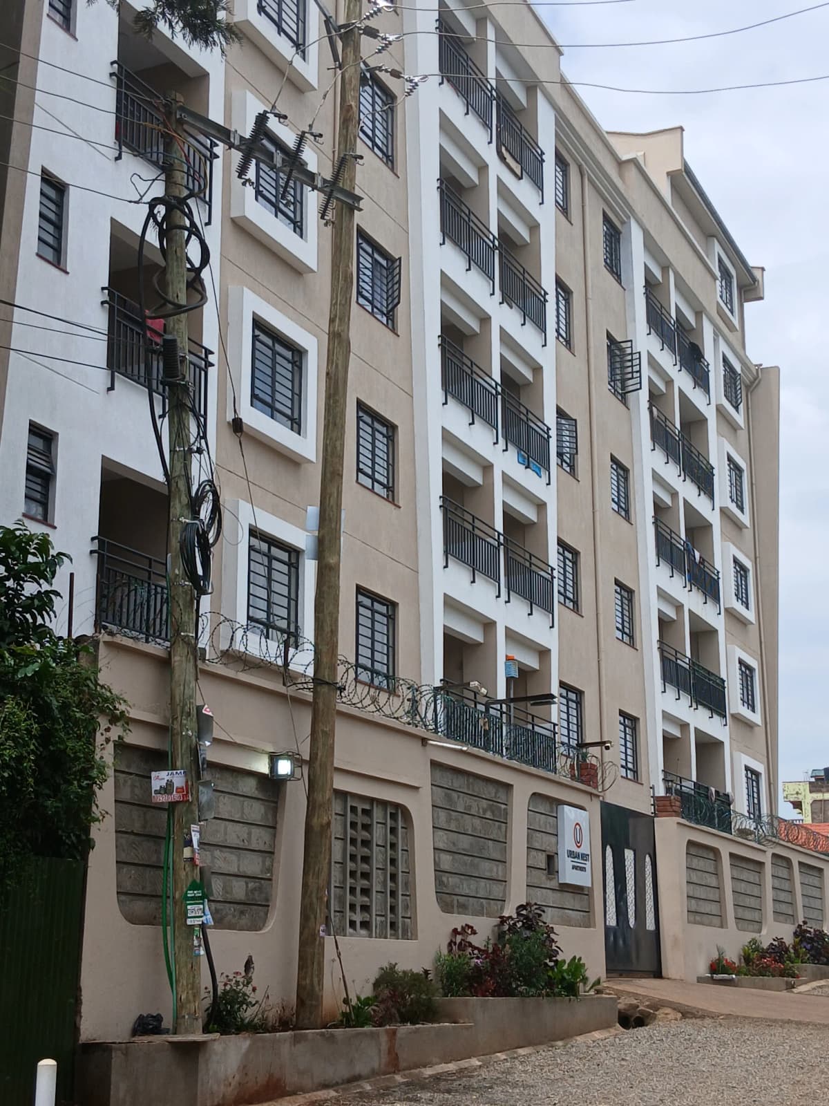 Multi-story residential building facade with balconies