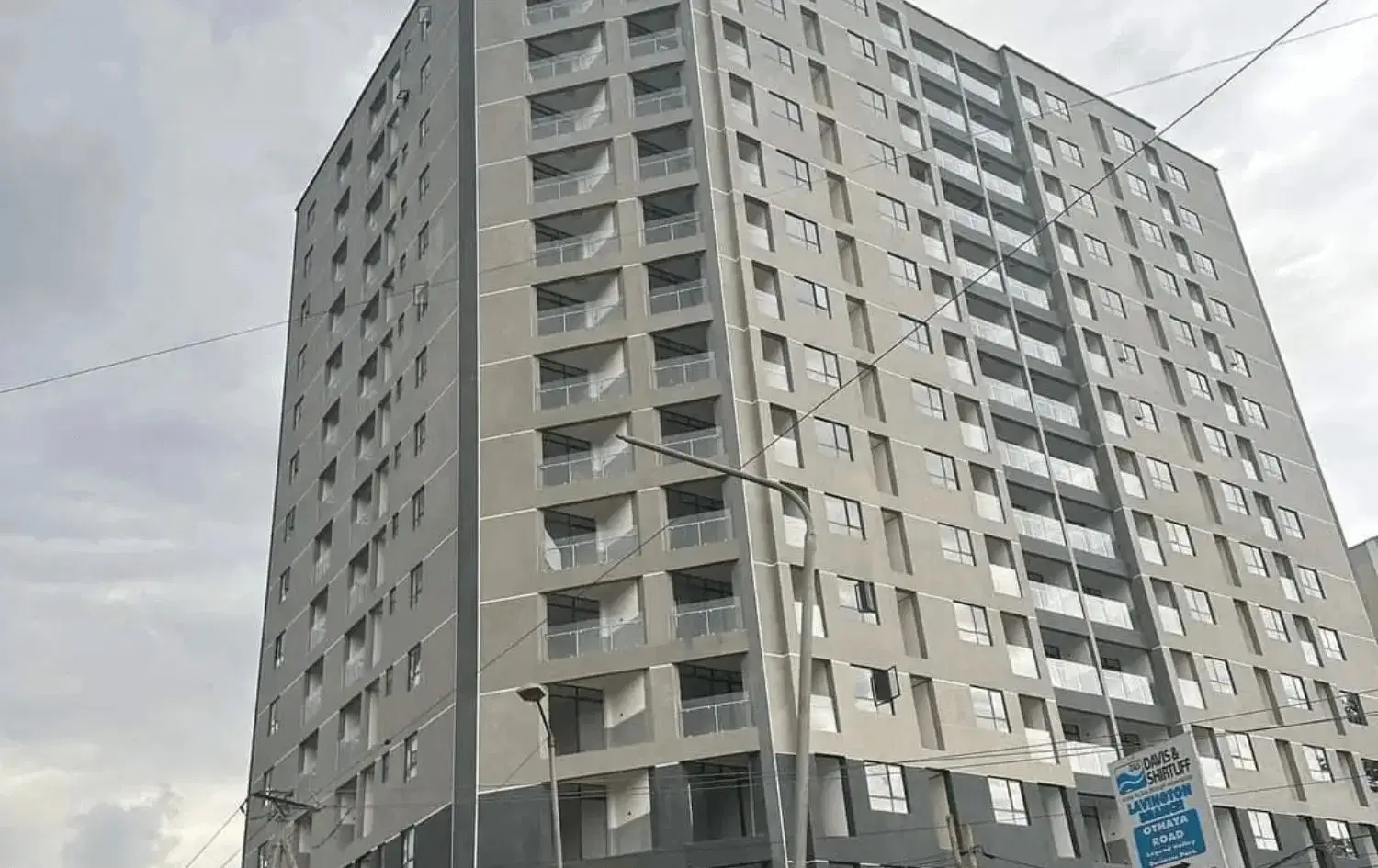 Multi-story residential building facade with balconies
