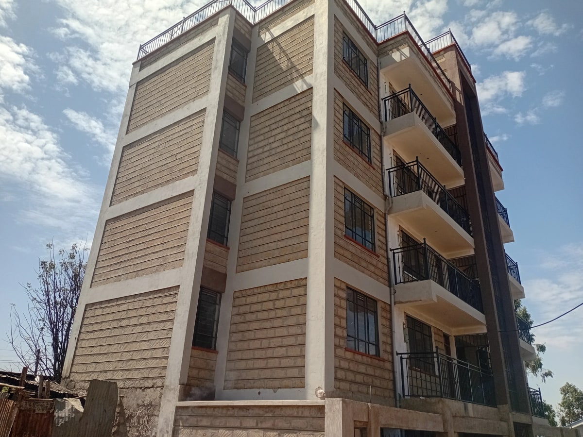 Multi-story residential building facade with balconies