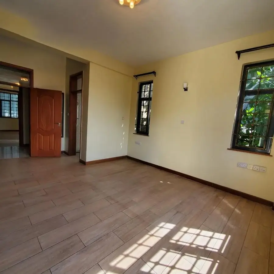 Spacious living area with terracotta tiles and natural light