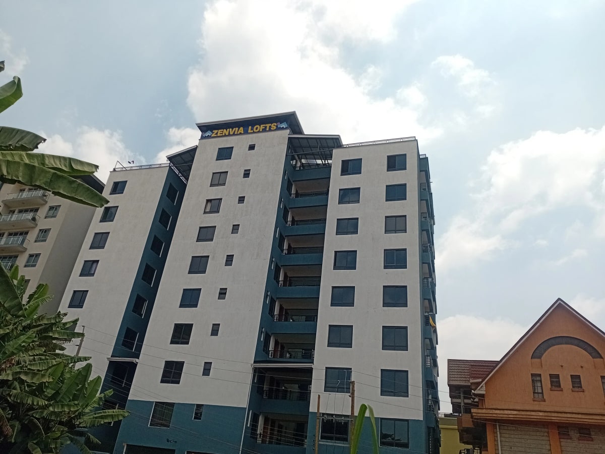 Modern multi-story apartment building facade with balconies