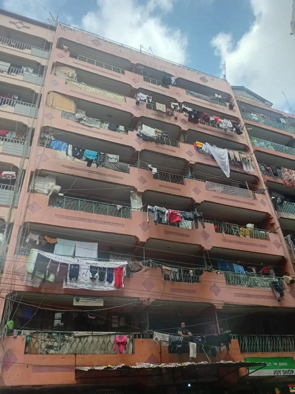 Multi-story residential building facade with balconies